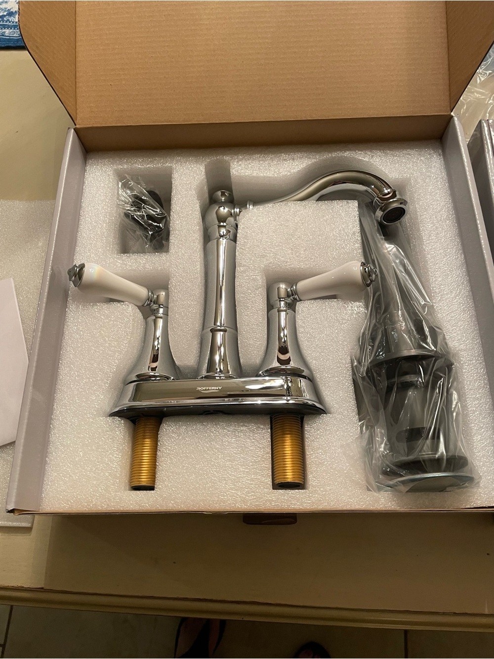 Polished Chrome White-Handle Two-Handle Bathroom Faucet $59.00 Each